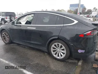 2018 Tesla Model X 75D with VIN 5YJXCBE25JF117801, listed as a IAAI auction lot 41798116 with 95,253 mi miles. Bid and sale history available at carsss.com. Image 3.