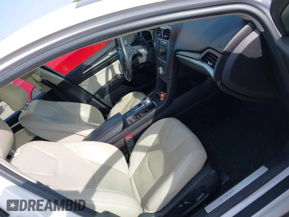 2017 Ford Fusion Hybrid Titanium с VIN 3FA6P0RU7HR148191, выставлен на аукционе IAAI как лот 42167708 с пробегом 72 708 миль миль и . История ставок и продаж доступна на DreamBid. Изображение 5.