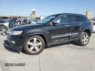 2013 Jeep Grand Cherokee Overland with VIN 1C4RJECT8DC556536, listed as a Copart auction lot 52758795 with 67,123 mi miles and Salvage Title. Bid and sale history available at carsss.com. Image 1.