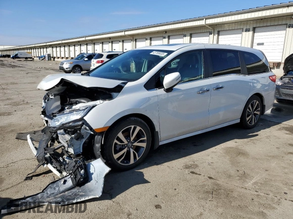 2023 Honda Odyssey Touring with VIN 5FNRL6H81PB005652, listed as a Copart auction lot 43769035 with 29,972 mi miles and Salvage Title. Bid and sale history available at DreamBid. Image 1.