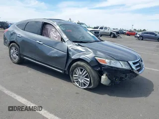2013 Honda Crosstour EX-L z VIN 5J6TF3H52DL004465, wystawiony jako IAAI lot #42268992 z przebiegiem 166 873 mil mil oraz . Historia ofert i sprzedaży dostępna na DreamBid. Obrazek 1.