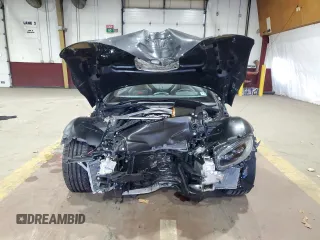 2021 Aston Martin Vantage z VIN SCFSMGBW2MGP05338, wystawiony jako Copart lot #80123274 z przebiegiem Nie podano mil oraz Szkody całkowita. Historia ofert i sprzedaży dostępna na DreamBid. Obrazek 5.