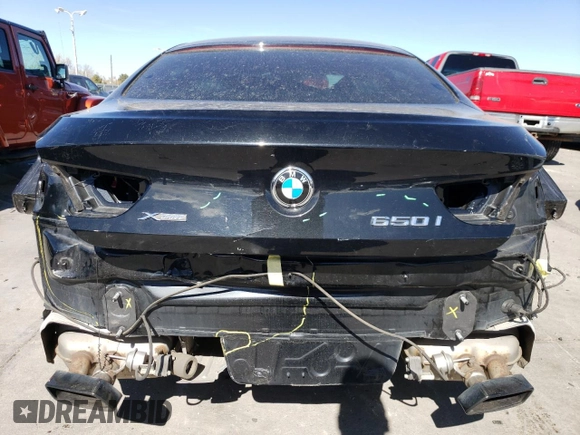 2015 BMW 6 Series 650i xDrive with VIN WBA6B4C55FD761124, listed as a Copart auction lot 50559555 with 49,735 mi miles and Salvage Title. Bid and sale history available at DreamBid. Image 6.