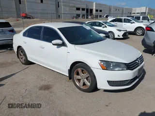 2014 Volkswagen Passat Wolfsburg Edition with VIN 1VWAS7A30EC053025, listed as a IAAI auction lot 42579059 with 168,446 mi miles and . Bid and sale history available at DreamBid. Image 1.