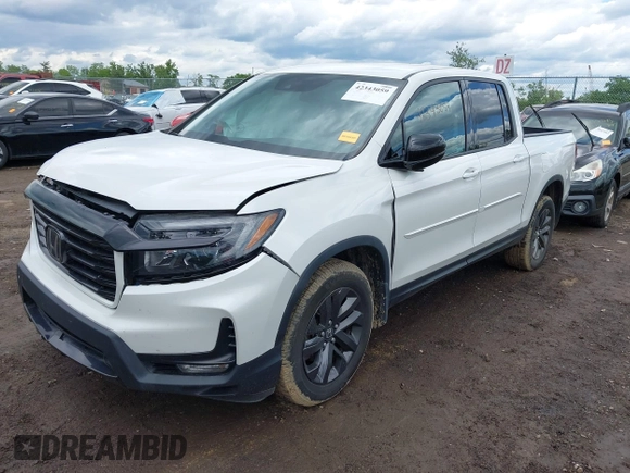 2021 Honda Ridgeline Sport with VIN 5FPYK3F14MB005117, listed as a IAAI auction lot 42343059 with 58,862 mi miles and . Bid and sale history available at DreamBid. Image 2.