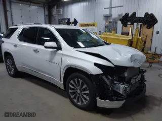 2023 Chevrolet Traverse Premier with VIN 1GNEVKKW0PJ180385, listed as a IAAI auction lot 41214484 with 26,830 mi miles. Bid and sale history available at carsss.com. Image 1.