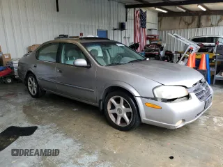 2001 Nissan Maxima SE z VIN JN1CA31A21T309782, wystawiony jako Copart lot #56696605 z przebiegiem 312 094 mil mil oraz Szkody całkowita. Historia ofert i sprzedaży dostępna na DreamBid. Obrazek 4.