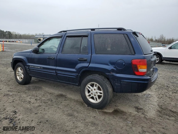 2004 Jeep Grand Cherokee Laredo with VIN 1J4GX48S64C165105, listed as a Copart auction lot 50301455 with 299,686 mi miles and Salvage Title. Bid and sale history available at carsss.com. Image 2.