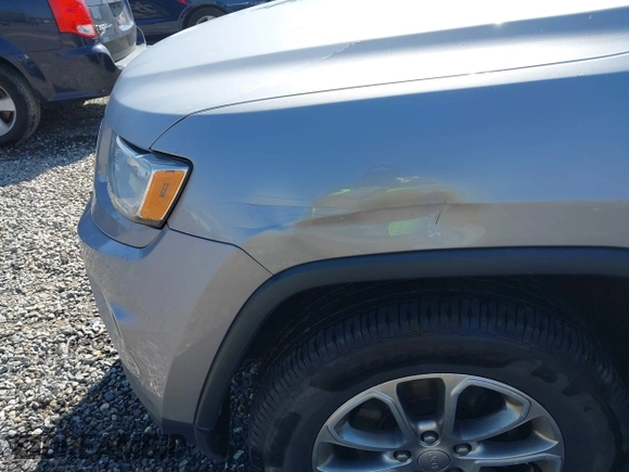 2014 Jeep Grand Cherokee Limited with VIN 1C4RJFBG5EC588971, listed as a IAAI auction lot 41971004 with 154,122 mi miles and . Bid and sale history available at DreamBid. Image 6.