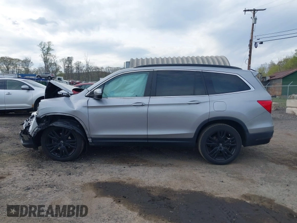 2021 Honda Pilot Special Edition with VIN 5FNYF6H20MB061334, listed as a IAAI auction lot 42123022 with 92,183 mi miles and . Bid and sale history available at DreamBid. Image 15.