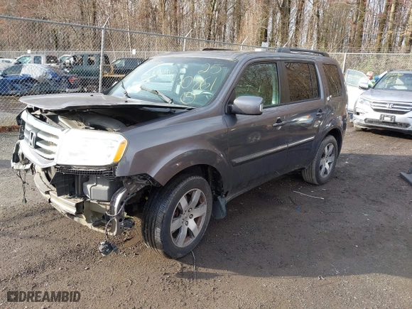 2015 Honda Pilot Touring with VIN 5FNYF4H96FB048883, listed as a IAAI auction lot 41796626 with 167,875 mi miles. Bid and sale history available at carsss.com. Image 17.