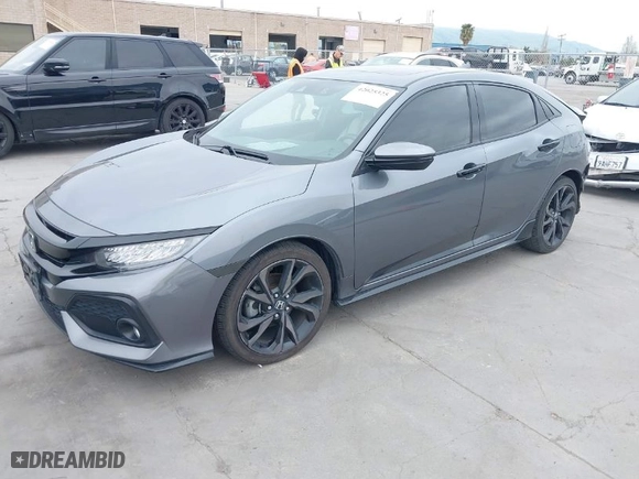 2018 Honda Civic Hatchback Sport Touring with VIN SHHFK7H90JU432590, listed as a IAAI auction lot 42025325 with 78,748 mi miles. Bid and sale history available at carsss.com. Image 2.
