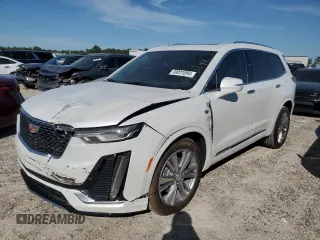 2024 Cadillac XT6 FWD Premium Luxury with VIN 1GYKPCRS1RZ700963, listed as a Copart auction lot 49031094 with 2,977 mi miles and Salvage Title. Bid and sale history available at carsss.com. Image 1.