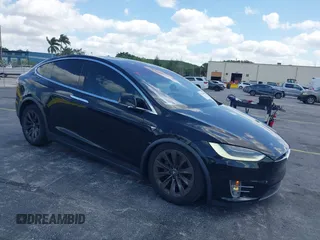 2017 Tesla Model X 90D with VIN 5YJXCBE21HF054898, listed as a IAAI auction lot 42076462 with 89,996 mi miles and . Bid and sale history available at DreamBid. Image 1.