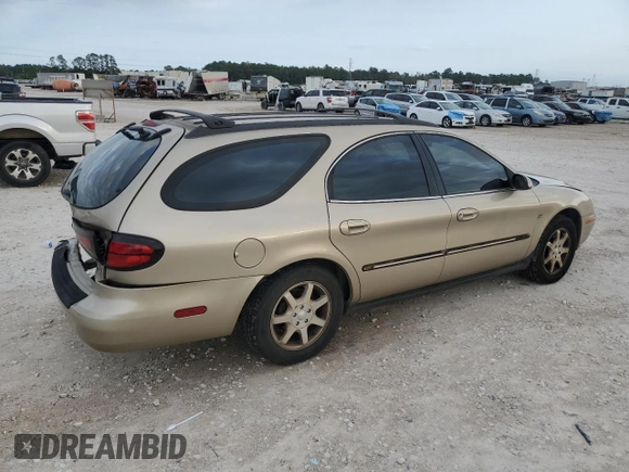 2001 Mercury Sable LS Premium z VIN 1MEFM59S11A639790, wystawiony jako Copart lot #79476074 z przebiegiem 96 496 mil mil oraz Szkody całkowita. Historia ofert i sprzedaży dostępna na DreamBid. Obrazek 3.