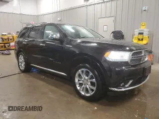 2018 Dodge Durango Citadel Anodized Platinum with VIN 1C4RDJEGXJC182877, listed as a Copart auction lot 83068134 with 84,545 mi miles and Salvage title. Bid and sale history available at DreamBid. Image 4.