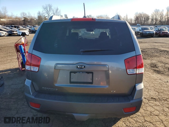 2009 Kia Borrego LX with VIN KNDJH741795017158, listed as a Copart auction lot 42489845 with 116,336 mi miles and Salvage Title. Bid and sale history available at DreamBid. Image 6.