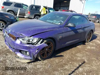 2014 BMW 4 Series 428i xDrive with VIN WBA3T1C58EPS98939, listed as a IAAI auction lot 41649313 with 35,994 mi miles and . Bid and sale history available at carsss.com. Image 2.