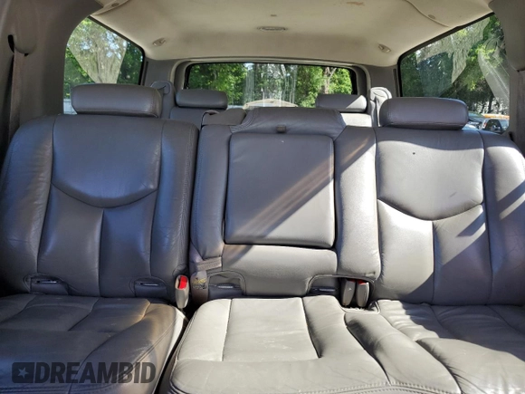 2004 Chevrolet Suburban Z71 with VIN 3GNFK16Z74G245340, listed as a Copart auction lot 57491305 with 283,174 mi miles and Salvage title. Bid and sale history available at DreamBid. Image 10.