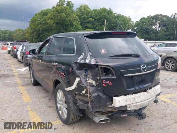 2010 Mazda CX-9 Grand Touring with VIN JM3TB2MA3A0201602, listed as a IAAI auction lot 42463599 with 331,533 mi miles and . Bid and sale history available at DreamBid. Image 3.