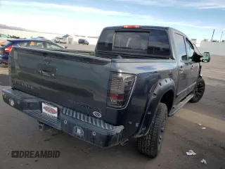 2013 Nissan Titan Pro-4X with VIN 1N6BA0EC2DN305708, listed as a Copart auction lot 45329275 with 68,636 mi miles and Salvage title. Bid and sale history available at DreamBid. Image 3.