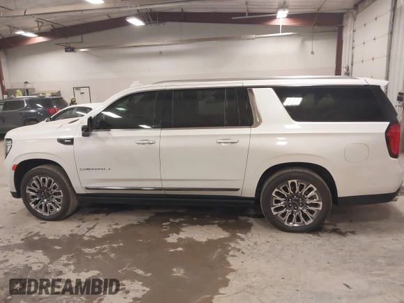 2023 GMC Yukon XL Denali Ultimate with VIN 1GKS2KKL9PR557408, listed as a IAAI auction lot 41275837 with 19,556 mi miles. Bid and sale history available at carsss.com. Image 14.