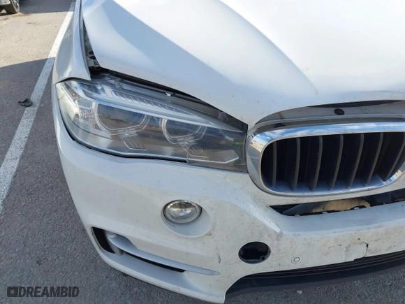 2016 BMW X5 xDrive35i with VIN 5UXKR0C52G0P29633, listed as a IAAI auction lot 41057391 with 176,697 mi miles. Bid and sale history available at carsss.com. Image 6.