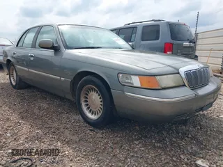 2002 Mercury Grand Marquis LS Premium z VIN 2MEFM75W62X605311, wystawiony jako IAAI lot #42213565 z przebiegiem 163 303 mil mil oraz . Historia ofert i sprzedaży dostępna na DreamBid. Obrazek 1.