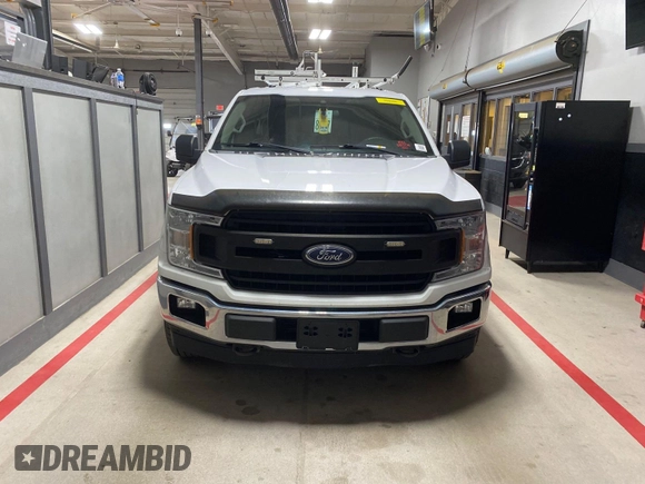 2019 Ford F-150 XL with VIN 1FTEX1EP0KKC71189, listed as a IAAI auction lot 42120247 with 188,329 mi miles. Bid and sale history available at carsss.com. Image 1.
