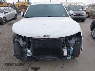 2017 Jeep Grand Cherokee Altitude z VIN 1C4RJFAG3HC707171, wystawiony jako IAAI lot #42145431 z przebiegiem 82 199 mil mil oraz . Historia ofert i sprzedaży dostępna na DreamBid. Obrazek 13.