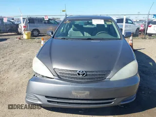 2004 Toyota Camry LE with VIN 4T1BF30K74U588368, listed as a IAAI auction lot 41659383 with 190,833 mi miles. Bid and sale history available at carsss.com. Image 6.