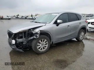 2015 Mazda CX-5 Touring with VIN JM3KE2CY4F0469096, listed as a Copart auction lot 48075105 with 131,788 mi miles and Salvage Title. Bid and sale history available at carsss.com. Image 1.