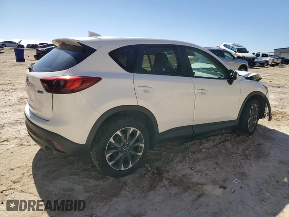 2016 Mazda CX-5 Grand Touring with VIN JM3KE4DY6G0857197, listed as a Copart auction lot 44500955 with 76,088 mi miles and Salvage Title. Bid and sale history available at DreamBid. Image 3.