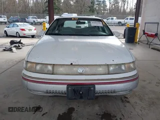 1992 Mercury Sable z VIN 1MECM5049NG647978, wystawiony jako IAAI lot #41805346 z przebiegiem 23 634 mil mil oraz . Historia ofert i sprzedaży dostępna na DreamBid. Obrazek 12.