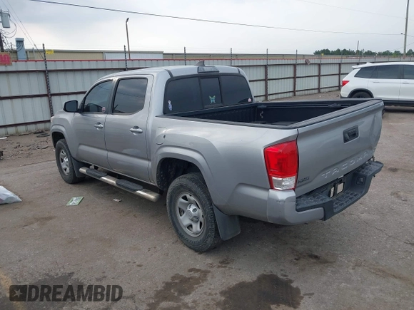 2017 Toyota Tacoma SR with VIN 5TFAX5GN6HX083614, listed as a IAAI auction lot 42314254 with 104,407 mi miles and . Bid and sale history available at DreamBid. Image 3.
