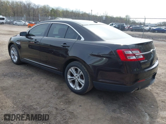 2013 Ford Taurus SEL with VIN 1FAHP2E87DG220389, listed as a IAAI auction lot 41930118 with 128,324 mi miles and . Bid and sale history available at carsss.com. Image 3.