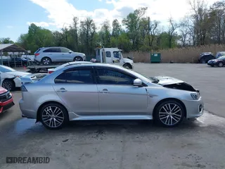 2017 Mitsubishi Lancer ES with VIN JA32V2FW9HU000485, listed as a IAAI auction lot 42019371 with 101,922 mi miles. Bid and sale history available at carsss.com. Image 13.