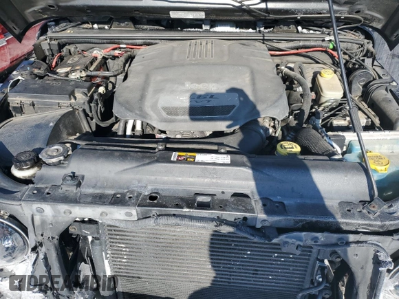 2013 Jeep Wrangler Unlimited Sport with VIN 1C4BJWDG7DL621806, listed as a Copart auction lot 87604805 with 158,885 mi miles and Salvage title. Bid and sale history available at DreamBid. Image 11.