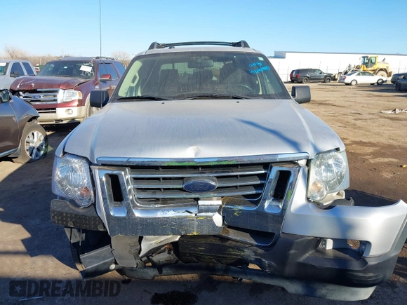 2010 Ford Explorer Sport Trac XLT z VIN 1FMEU3BE6AUF01646, wystawiony jako IAAI lot #41646440 z przebiegiem 58 473 mil mil oraz . Historia ofert i sprzedaży dostępna na DreamBid. Obrazek 13.