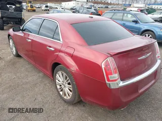 2012 Chrysler 300 C with VIN 2C3CCAKT4CH217217, listed as a IAAI auction lot 41502473 with 193,258 mi miles and . Bid and sale history available at DreamBid. Image 3.