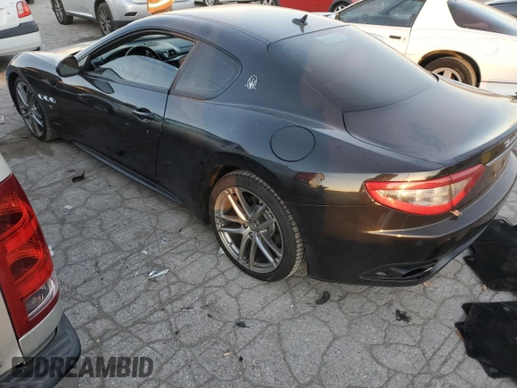 2013 Maserati GranTurismo Sport with VIN ZAM45VLA7D0073260, listed as a Copart auction lot 85929914 with 74,045 mi miles and Salvage title. Bid and sale history available at DreamBid. Image 2.