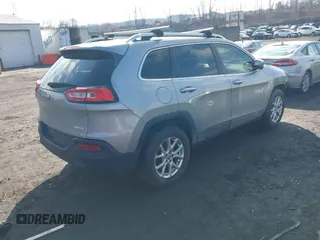 2014 Jeep Cherokee Altitude with VIN 1C4PJMCB5EW167961, listed as a IAAI auction lot 41660440 with 88,705 mi miles and . Bid and sale history available at DreamBid. Image 4.