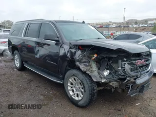 2015 GMC Yukon XL SLT with VIN 1GKS1HKC8FR219289, listed as a IAAI auction lot 40772496 with 163,477 mi miles. Bid and sale history available at carsss.com. Image 13.