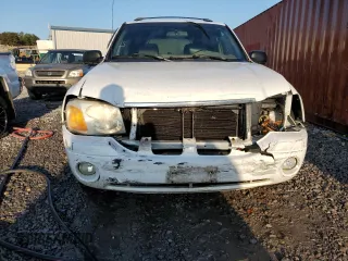 2003 GMC Envoy SLE z VIN 1GKDS13S532369187, wystawiony jako Copart lot #79922934 z przebiegiem 223 997 mil mil oraz Szkoda całkowita • Salvage title. Historia ofert i sprzedaży dostępna na DreamBid. Obrazek 5.