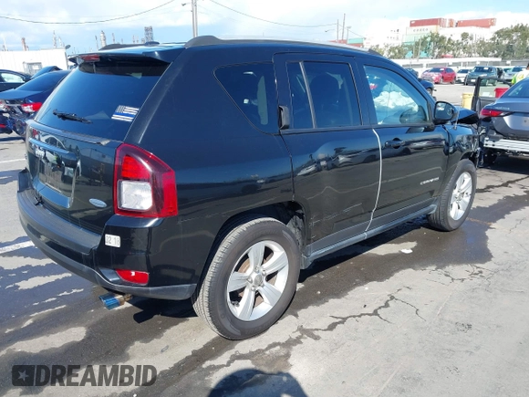 2016 Jeep Compass Latitude with VIN 1C4NJCEB2GD628384, listed as a IAAI auction lot 41752694 with 122,589 mi miles. Bid and sale history available at carsss.com. Image 4.