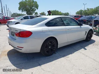 2015 BMW 4 Series 428i xDrive with VIN WBA3N5C58FK198825, listed as a IAAI auction lot 41919172 with 125,421 mi miles. Bid and sale history available at carsss.com. Image 4.