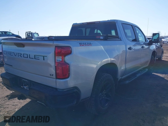 2022 Chevrolet Silverado 1500 LT Trail Boss with VIN 1GCPYFED5NZ121454, listed as a IAAI auction lot 41727229 with 42,302 mi miles and . Bid and sale history available at DreamBid. Image 4.