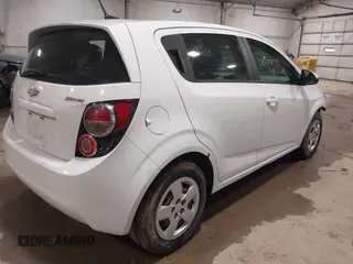 2014 Chevrolet Sonic LS with VIN 1G1JA6SG4E4208132, listed as a IAAI auction lot 38646142 with 154,013 mi miles and . Bid and sale history available at DreamBid. Image 4.