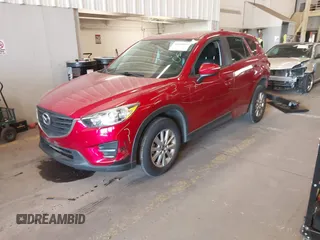 2016 Mazda CX-5 Sport z VIN JM3KE2BY3G0684861, wystawiony jako IAAI lot #42050897 z przebiegiem 165 688 mil mil oraz . Historia ofert i sprzedaży dostępna na DreamBid. Obrazek 20.
