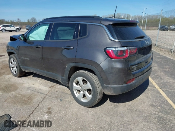 2018 Jeep Compass Altitude with VIN 3C4NJDBB6JT239565, listed as a IAAI auction lot 42219401 with 85,013 mi miles and . Bid and sale history available at DreamBid. Image 3.